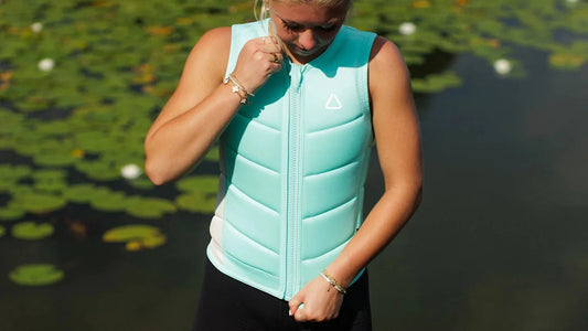 Follow Corp Women's Wake Impact Vest Mint - on-water action shot 1