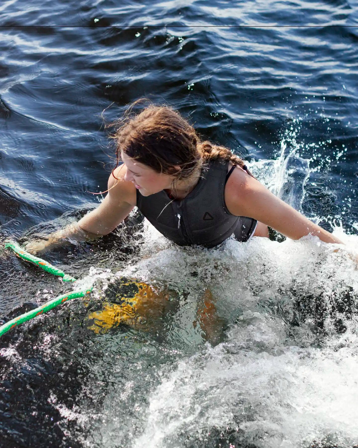 Follow Corp Women's Wake Impact Vest Black - on-water action shot 2