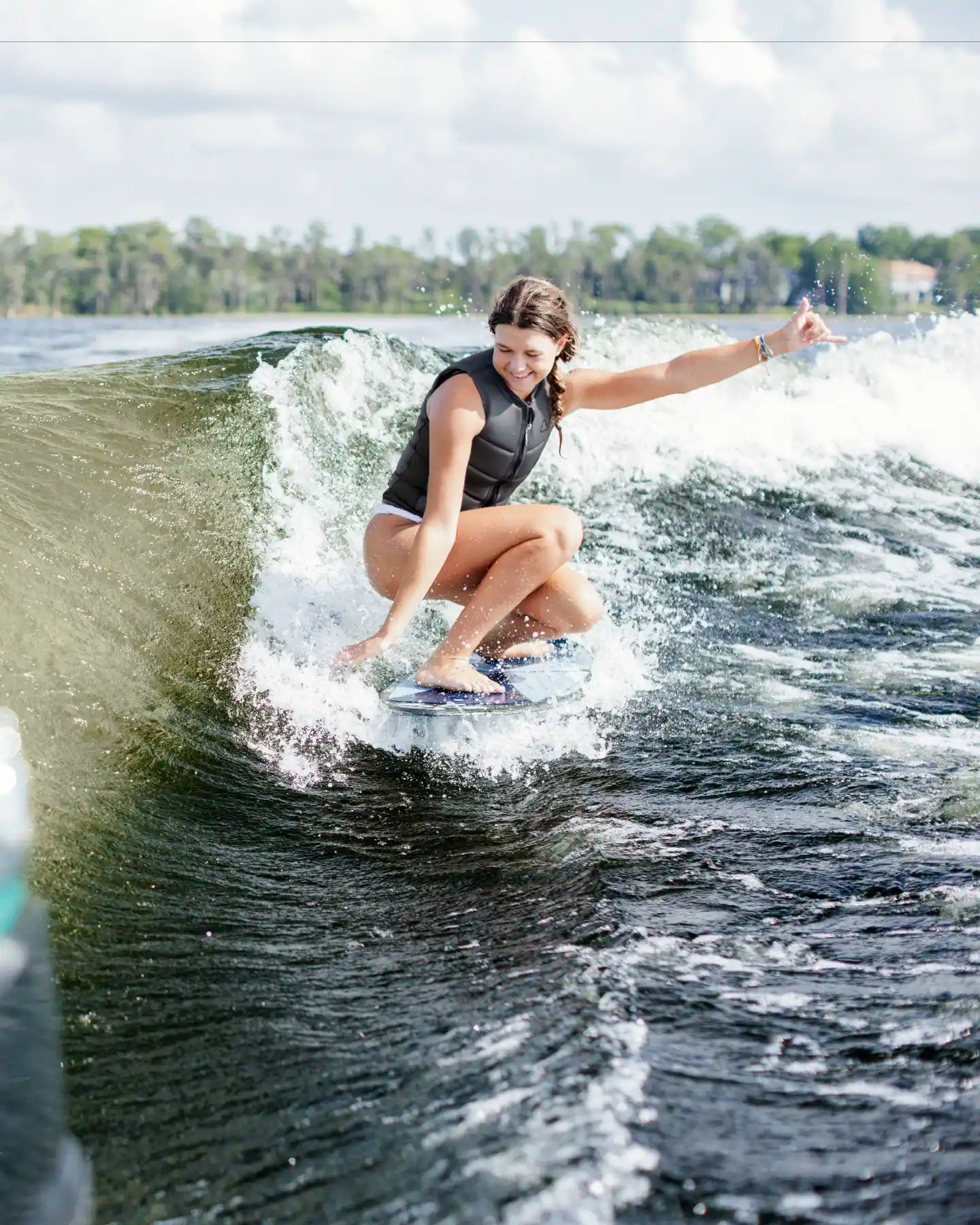Follow Corp Women's Wake Impact Vest Black - on-water action shot 3