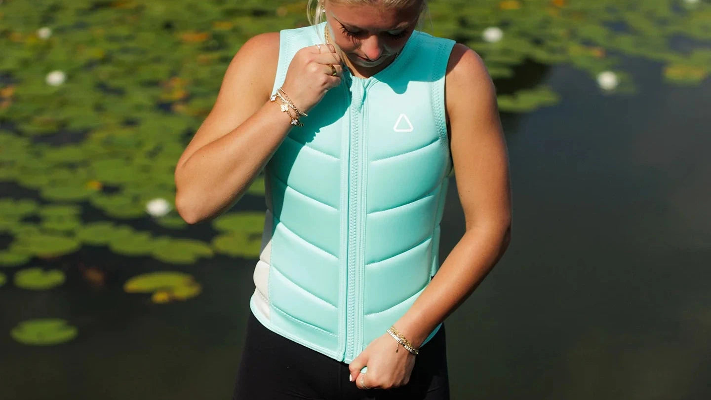 Follow Corp Women's Wake Impact Vest Mint - on-water action shot 1