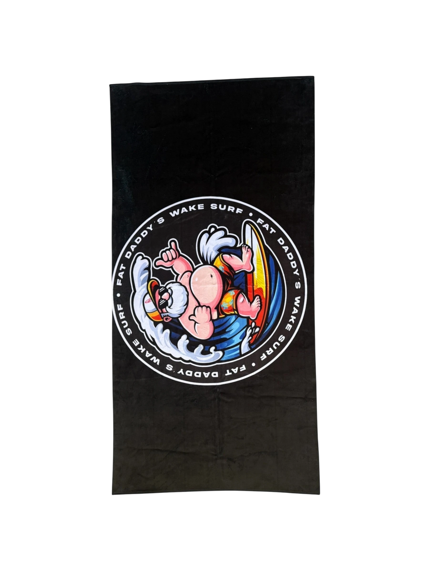 Fat Daddy's Wake Surf black quick-dry towel featuring a cartoon character surfing on a surfboard with waves.